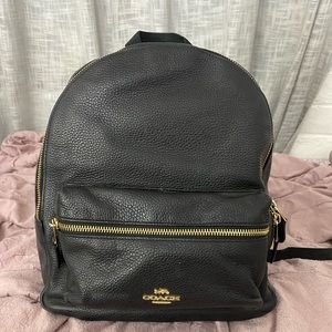 Black leather coach backpack with 2 zipper pockets